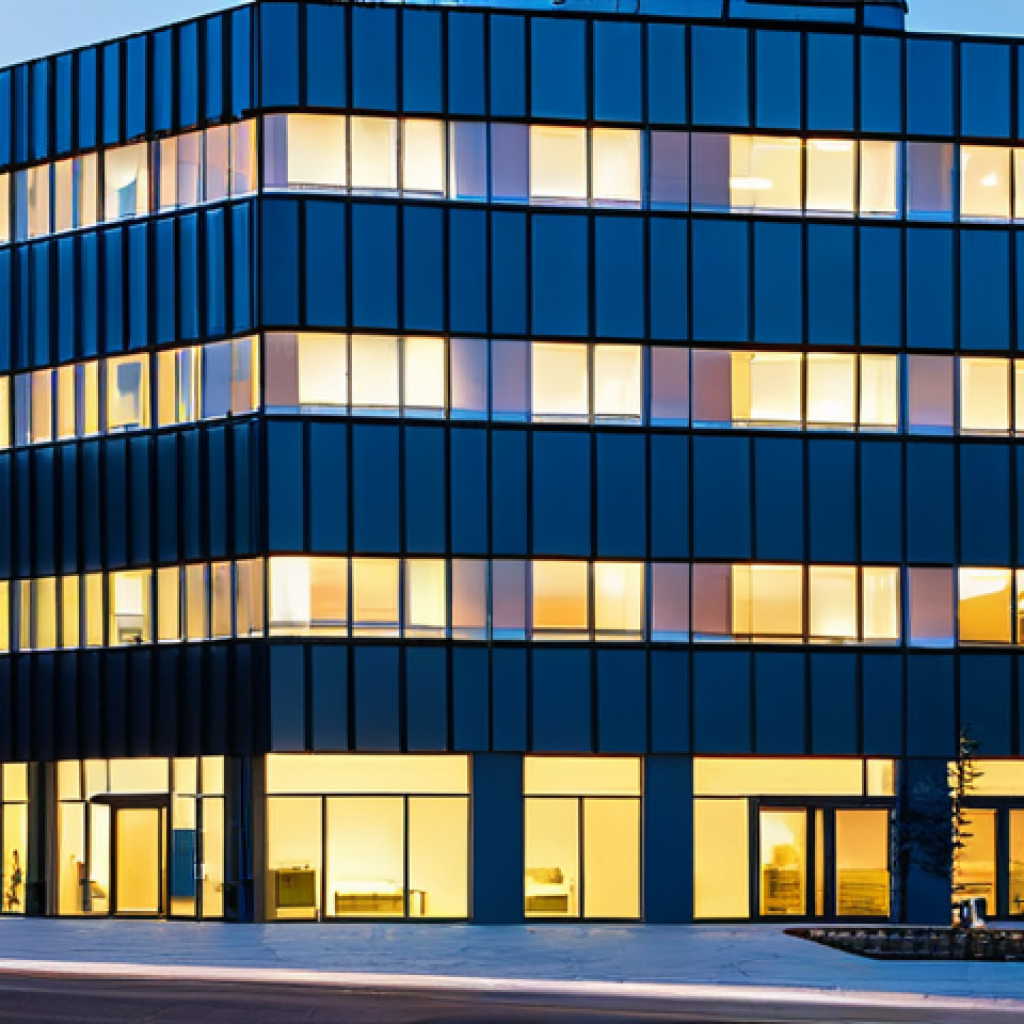 Smart Building Energy Efficiency**
"A modern office building at dusk, showcasing intelligent lighting and automated window shades. Inside, employees are working efficiently, bathed in soft, natural light. Sensors are subtly visible, monitoring occupancy and adjusting energy usage. The scene conveys sustainability and technological advancement. fully clothed, appropriate attire, safe for work, perfect anatomy, natural proportions, professional architecture photography, high quality, professional, modest."
**